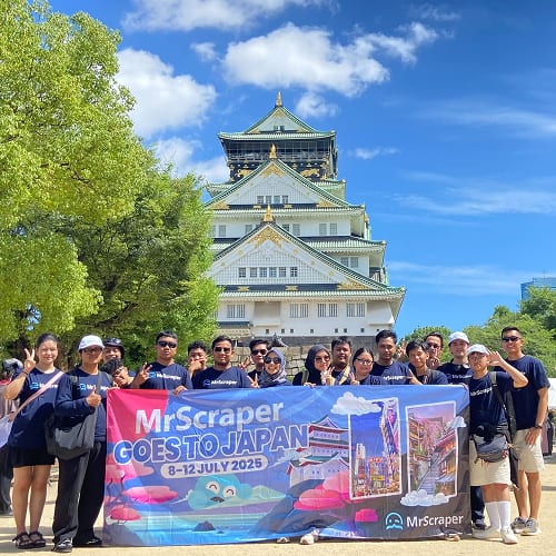MrScraper team members outside a castle in Japan
